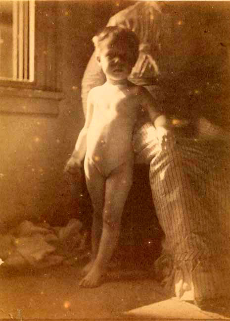 Boy nude, standing at sitting woman's knee (Нагой мальчик, стоящий у колена сидящей женщины), c.1885