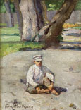 A boy sitting before a tree