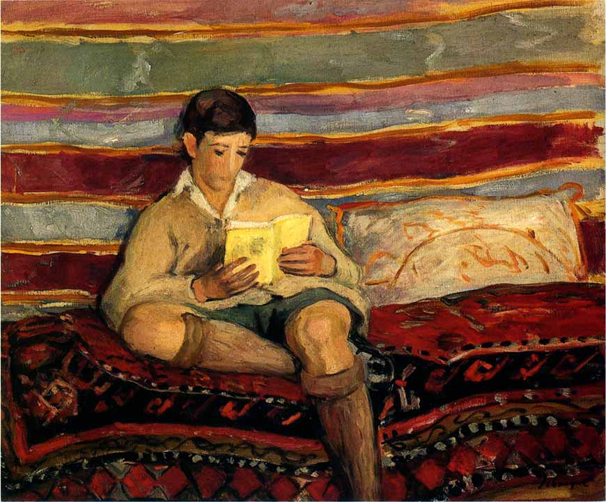 Young boy reading (Мальчик за чтением)