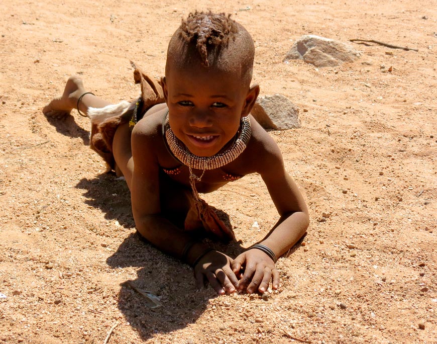 Young Himba boy with the typical one braid backwards (Мальчик племени химба с типичной косой, заплетенной сзади), 2013