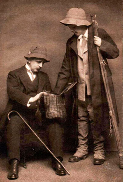 J.M. Barrie and his beloved Micheal Llewelwyn Davies, then 12, while fishing in Scotland