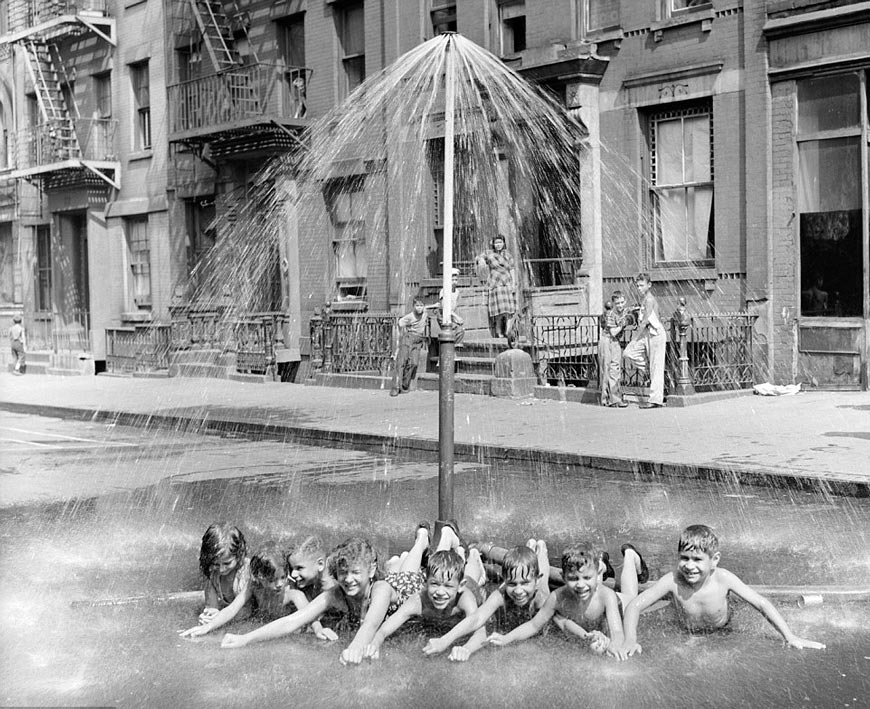 Children  play in a makeshift shower (Дети играют в импровизированном душе), 1948