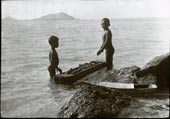 Two boys standing in the water / Два мальчика стоят в воде