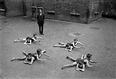 Children learn to swim in a schoolyard / Дети учаться плавать в школьном дворе