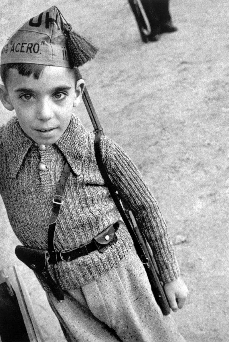 The boy is wearing a cap of the Steel Battalions (Мальчик в пилотке Стальных батальонов), 1936 