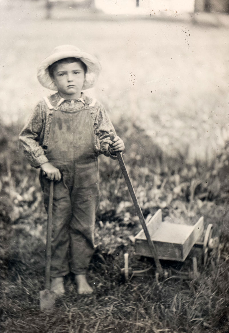 Barefoot boy outdoor with toy shovel and wagon (Босоногий мальчик с игрушечной лопаткой и повозкой), c.1870