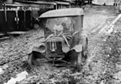 Boy sitting on the bonnet of a car / Мальчик сидит на капоте машины