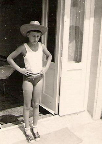 Boy standing in the sunshine, wearing underwear and a large hat (Мальчик, стоящий на солнце в нижнем белье и большой шляпе), 1950s