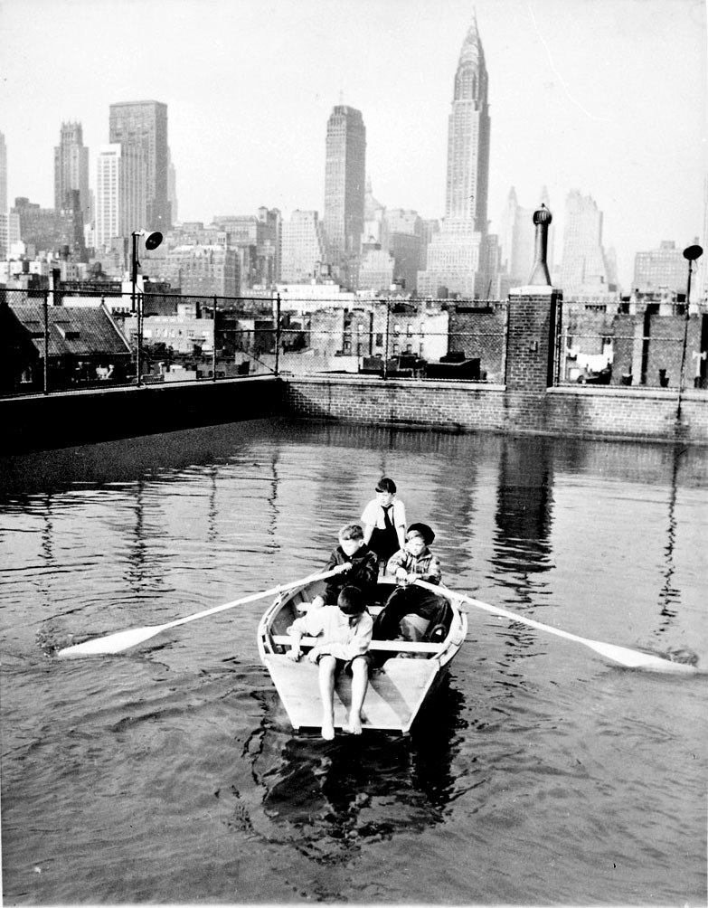 Madison Square Boy’s Club rowing a boat in a rooftop pool, Manhattan, 1950s