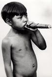 Boy smoking a cigar / Мальчик, курящий сигару