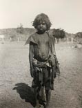 Aranda boy wearing cast-off clothing / Мальчик народности аранда в подобранной брошенной одежде