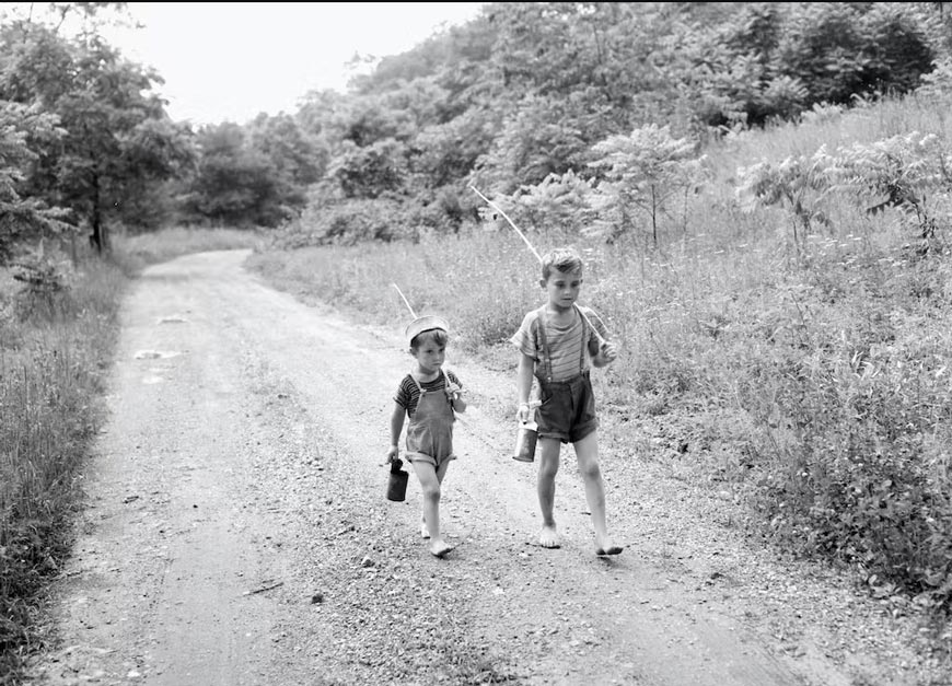 Two young boys head home after fishing (Два мальчика, идущие домой после рыбалки), c.1950