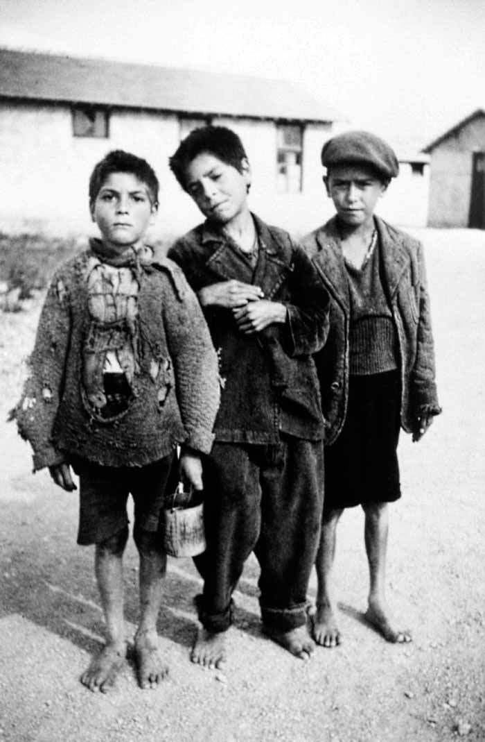 Portrait of three young Roma (Gypsy) boys interned at Camp de Rivesaltes (Портрет трех цыганских мальчиков, интернированных в лагерь Ривесальт), 1941-1942 