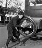 A boy inflates his football / Мальчик, накачивающий футбольный мяч