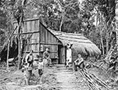 Group outside a wooden hut /Группа снаружи деревянной хижины