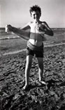 Young boy on a beach after a swim / Мальчик на берегу после купания