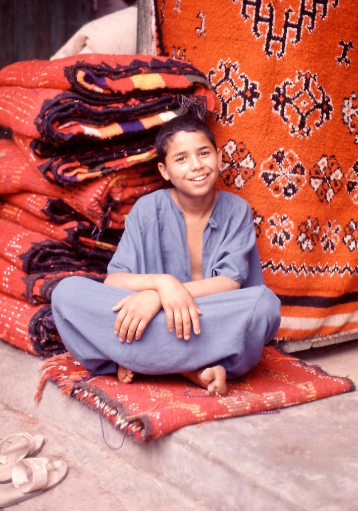 Boy in front of his dad's shop (Мальчик перед магазином своего отца), 2018