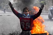 Demonstrators block roads and streets as they burn tires during protest against the power cuts and economic crisis / Демонстранты 