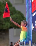 A boy holds an Albanian flag / Мальчик держит албанский флаг