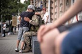 Мальчик обнимается с членом ЧВК Вагнер / A young boy hugs a member of Wagner group