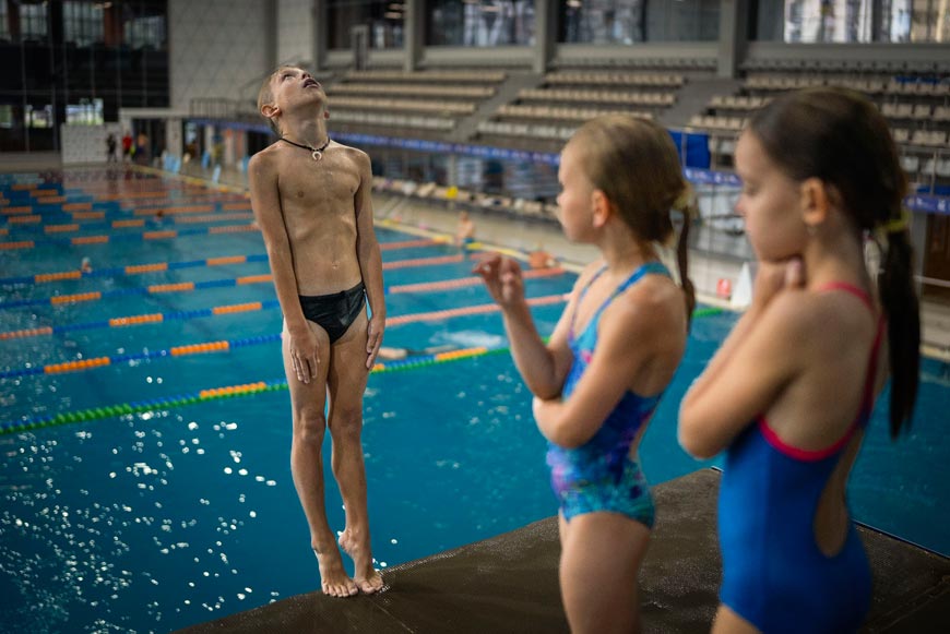 A boy dives into the water during training in Kyiv's Liko Diving School (Мальчик ныряет в воду во время тренировки в киевской школе дайвинга «Лико»), 2024 Kyiv