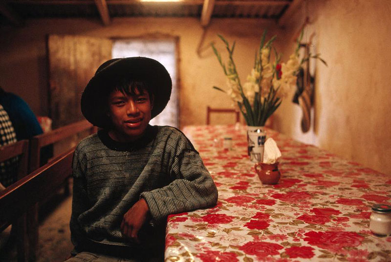 Young Indian boy inside home (Индийский мальчик в своём доме). Chicahuaxtla. Trique region, Mexico, 1992