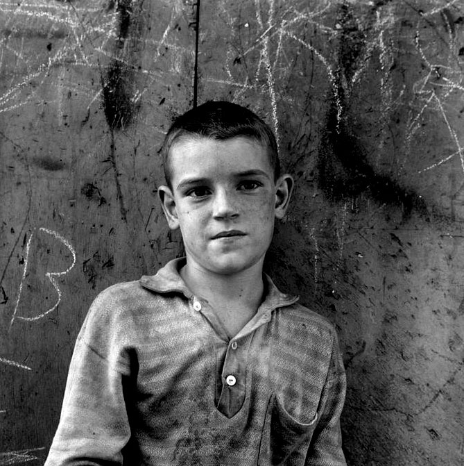 Young man at wall (Юноша у стены)