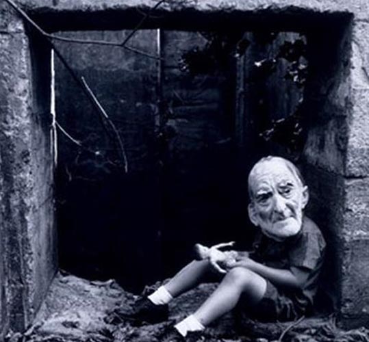 Boy in old man's mask with doll (Мальчик в маске старика с куклой), 1960