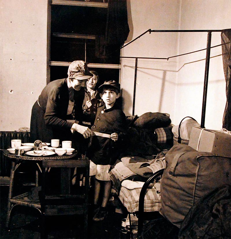 A Russian family (Mrs. Mary Mescheriakoff, son Tom, and daughter) at a internment camp (Русская семья (г-жа Мария Мещерякова, сын Том и дочь) в лагере для интернированных), Sept.1945