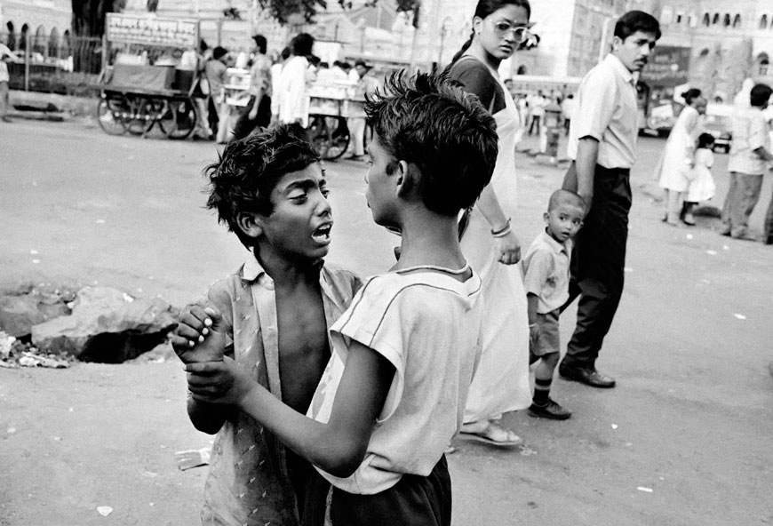 Street children Laxman and Babu fighting outside the Victoria Terminus Station