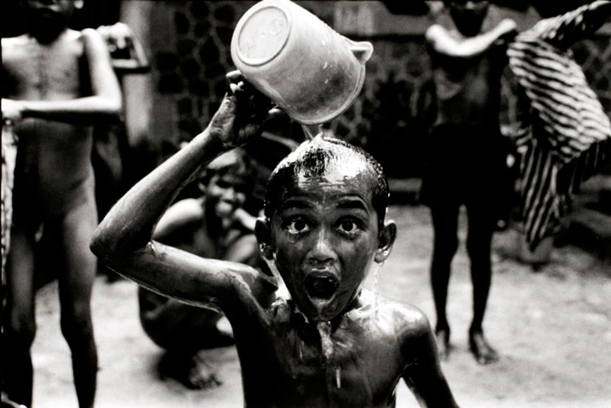 Street children taking their weekly bath at the Pavement Club