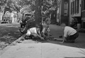 Children playing on sidewalk (Дети, играющие на тротуаре), September 1935