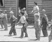 Schoolhouse and school scene (Сцена у школьного здания), June 1936