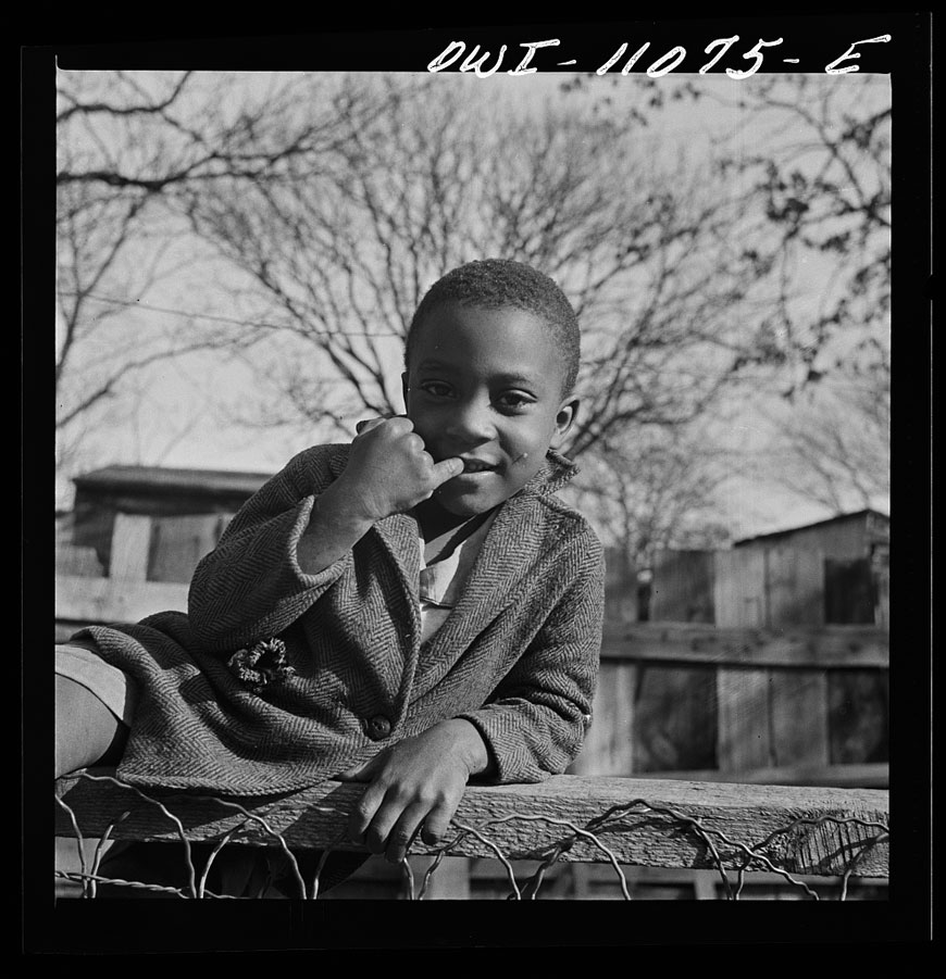 Boy playing on a fence (Мальчик, играющий на ограде), November 1942