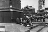 Homeless children at the monument to Pushkin