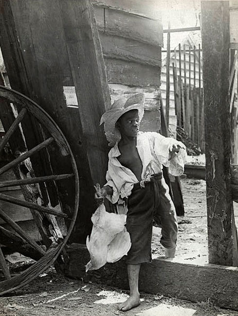 Barefoot Boy Carrying Chicken by Feet (Босоногий мальчик, несущий за ноги курицу)