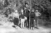 Grandfather and his grandchildren go fishing