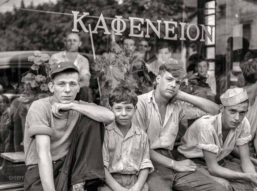 Boys in the town in front of Greek coffee shop (Мальчики города перед греческим кофейным магазином), July 1938