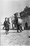 Mother and son returned from the village in the liberated Smolensk after German occupation