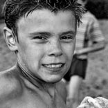 Portrait of a boy after swimming in the lake