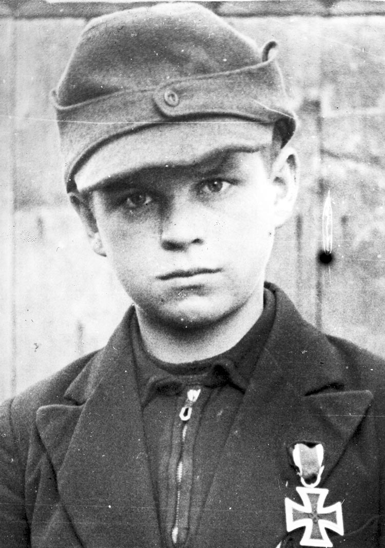 Militiaman of Volkssturm Alfred Cech (12), awarded the Iron Cross 2nd class (Ополченец фольксштурма Альфред Чех (12), награжденный Железным крестом 2-го класса), March 1945