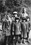 German soldier with village children