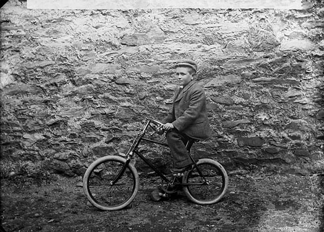 [Boy on a bicycle / Мальчик на велосипеде], c.1885