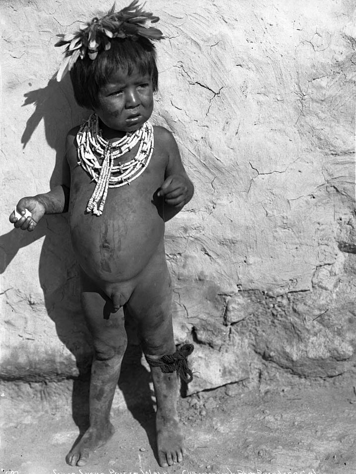 Small Hopi boy, the son of a Snake Priest, at the pueblo of Walpi (Мальчик хопи, сын Змеиного Жреца, в пуэбло Вальпи), c.1898