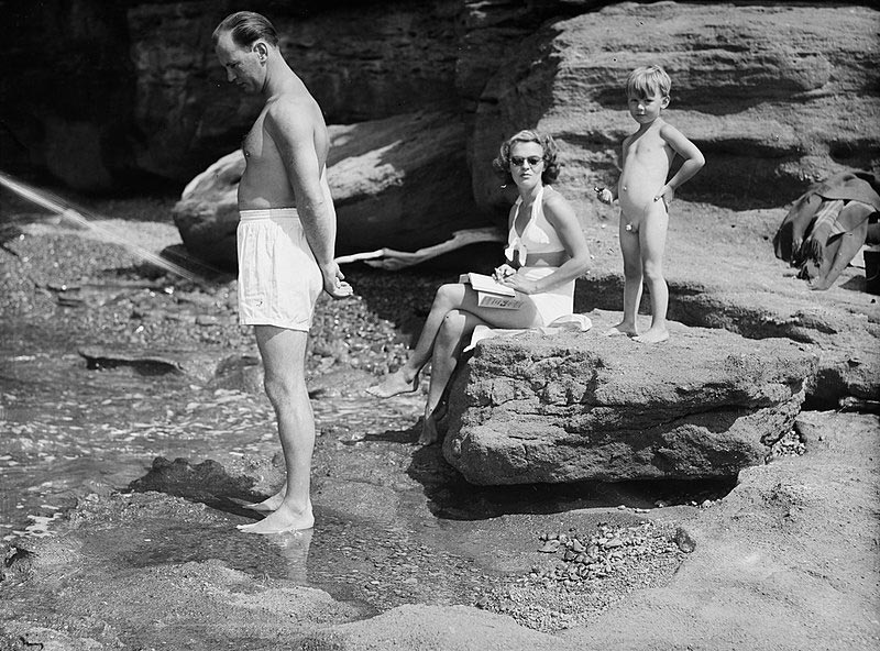 [A naked boy, a woman and a man in bathing suits / Голый мальчик, женщина и мужчина в купальных костюмах]