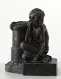A homeless boy at a pole